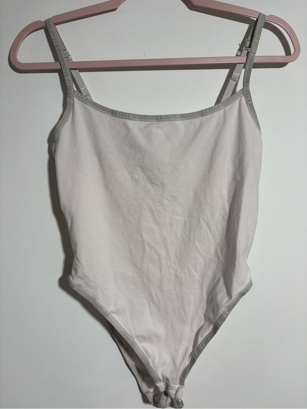 Skims White One-Piece Bodysuit with Grey Trim with Logo